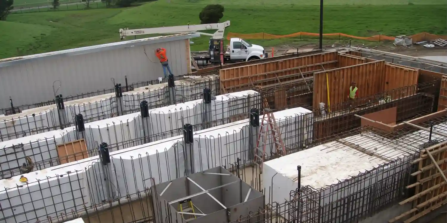 Concrete workers working with EPS foam